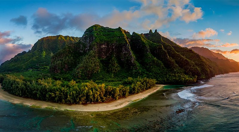 Panoramic image of Hawaii in front of a sunset landscape to support celebrity homes article