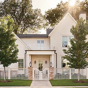 White home with picket fence