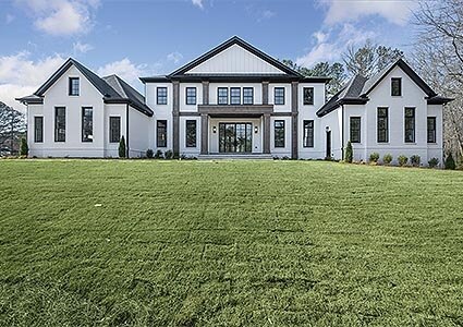 luxury home with large lawn