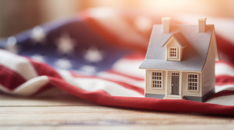 Model of a detached house on the American flag to visualize the US housing market