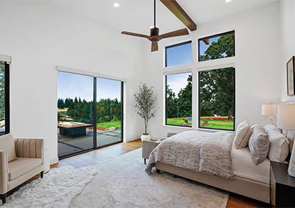 primary bedroom with large windows and tall ceilings 2023 Tour of Homes by Foksha Homes in Salem Oregon