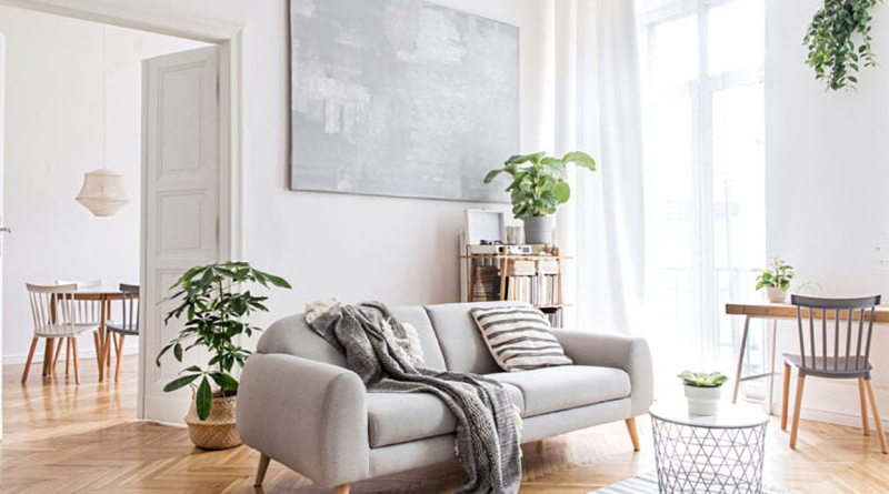 Scandinavian design in living room with plants and neutral colors