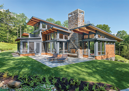 Brown House Exterior with a Lean-to Roof