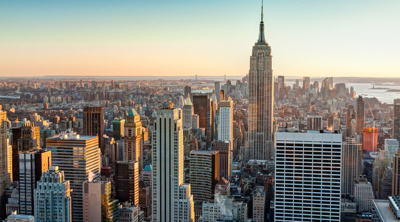 The Manhattan skyline at sunset to support luxury real estate article