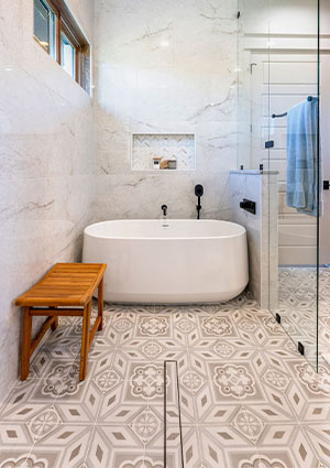 Soothing shower sprayers on one side, and a large soaking tub on the other