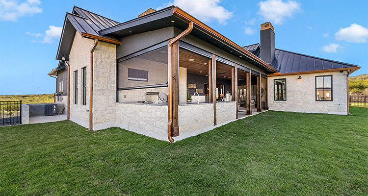 White stone house with wooden framing