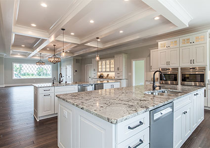 Modern kitchen with marble worksurfaces