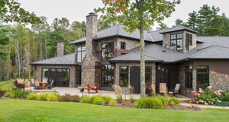 Discover how Bruckelmyer Brothers has elevated its approach to client care through cutting-edge technology a large, custom-built residential house, specifically identified as "Aqua Terra" by Andersen