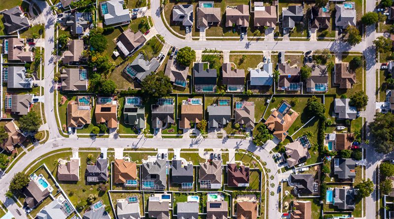 Aerial view of Miami skyline with residential homes and condos