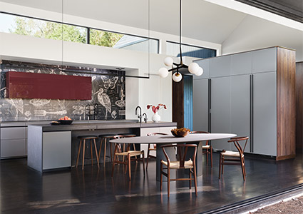 a modern, open-concept kitchen and dining area