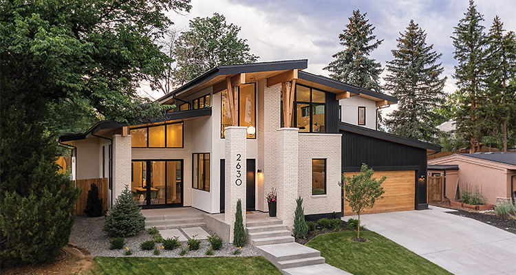 How Story marries cutting edge technology with excellent communication to provide clients with the ultimate experience in custom home building a modern, two-story house with a distinctive architectural style, likely featuring mid-century modern influences