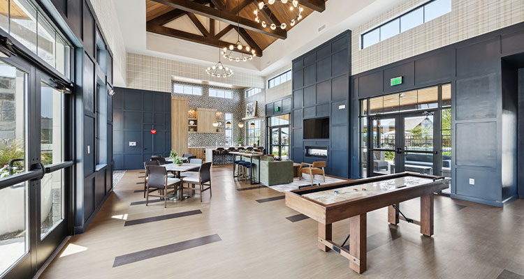 Combining elegance, affordability and charm, Trophy Signature Homes is transforming Texas with sophisticated homes and lively communities a spacious and modern common area or clubhouse, specifically identified as part of The Crest at Oakwood Apartments