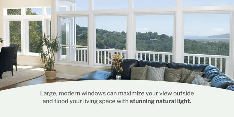 Open plan living room with large glass windows and doors