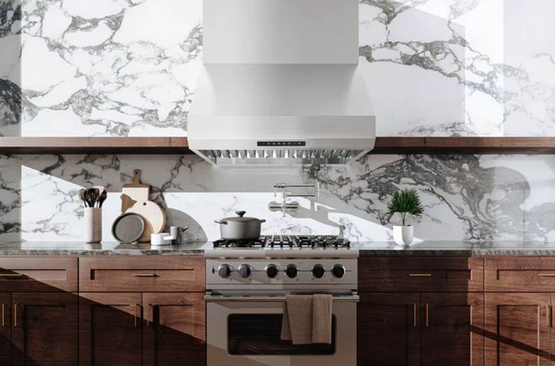 Modern kitchen featuring Hauslaneunder-cabinet range hoods