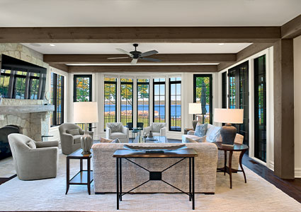 Modern open plan living area by Orren Pickell