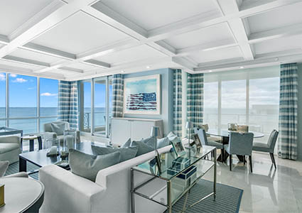 Coastal themed open plan living and dining area by Steve Cury Construction