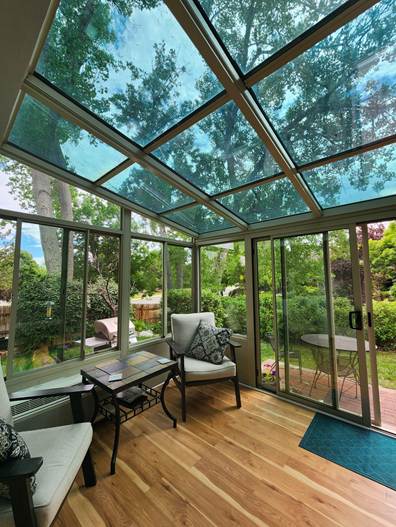 A garden sunroom brings the outdoors in. Project by Colorado Sunroom and Window.