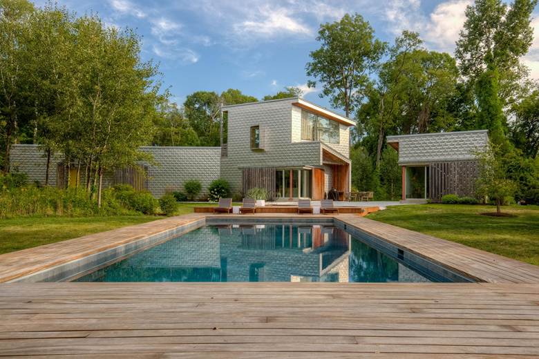 Wooden Decking around Pool and Spa by Neave Outdoor.