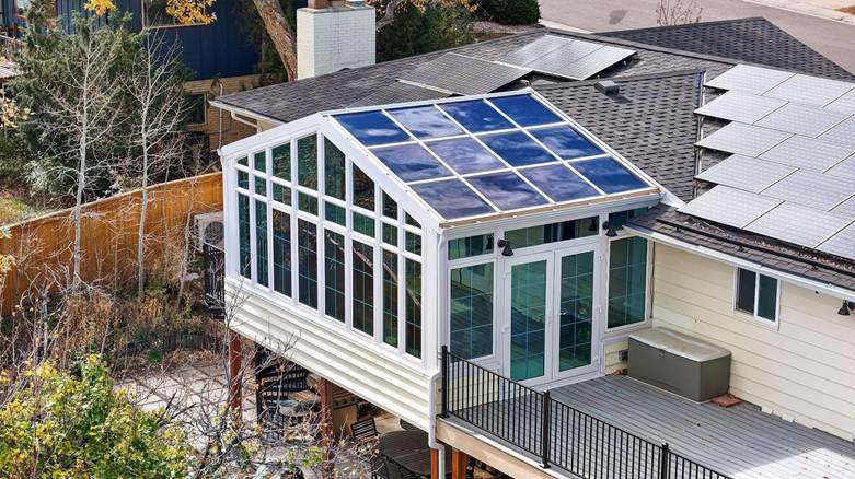 A second-story addition sunroom for all-year usage by Colorado Sunroom and Window.