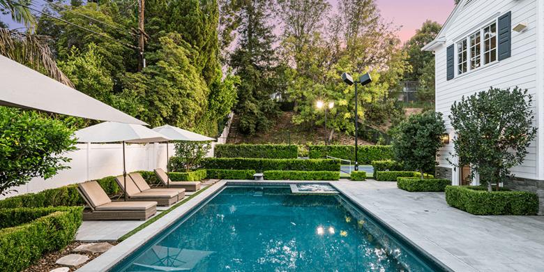 Swimming pool in backyard financed by Lyon Financial