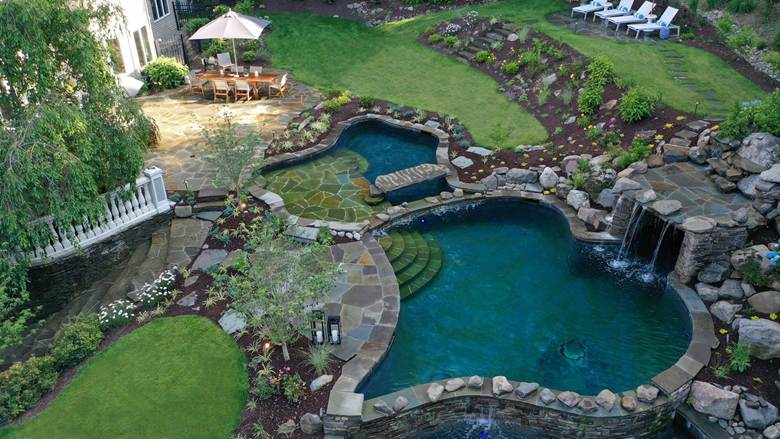 The freeform natural pool and spa project aerial view by Neave Outdoor.