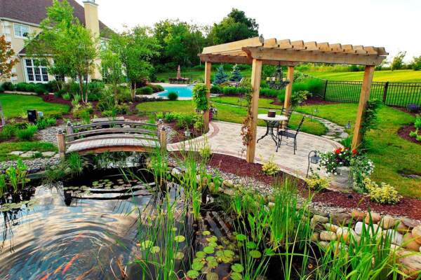 The freeform natural pool and spa project aerial view by Neave Outdoor.