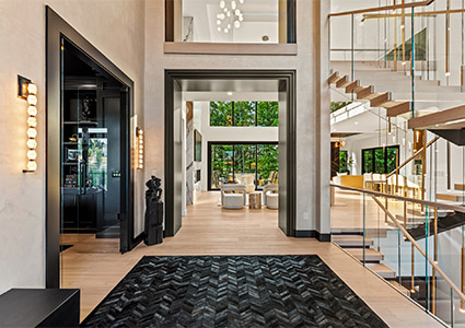 the interior foyer of "The Aurora," a modern custom luxury home designed by Berg Development