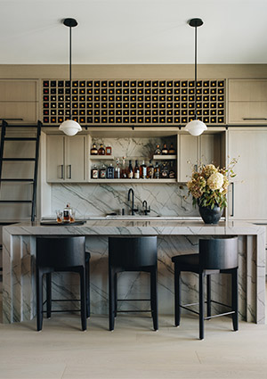 a stylish, modern bar area that is part of a penthouse design project called "Alabaster Aura"