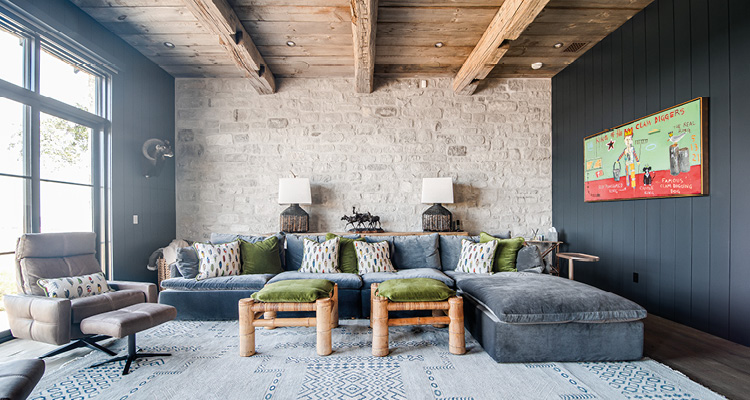 a living room designed with a rustic and modern aesthetic