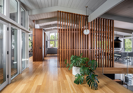 he interior of a residential home designed with a mid-century modern aesthetic.