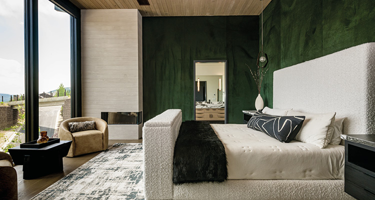 a modern, high-end bedroom that balances rich textures with a moody, sophisticated color palette.