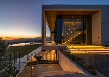 a modern architectural residence at dusk
