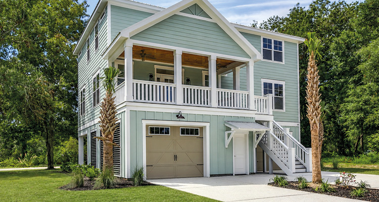 a raised coastal-style home, often referred to as a Lowcountry or elevated stilt home