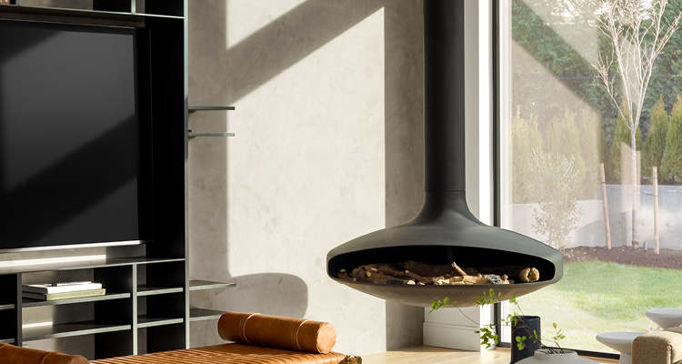a modern black Gyrofocus suspended fireplace