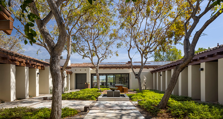 Spanish-style home patio courtyard in Rancho Santa Fe, California, renovated by West Coast General Building Contractors