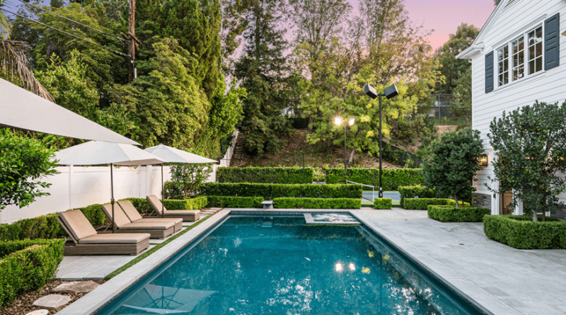 Custom built house with pool to support financing partnerships article