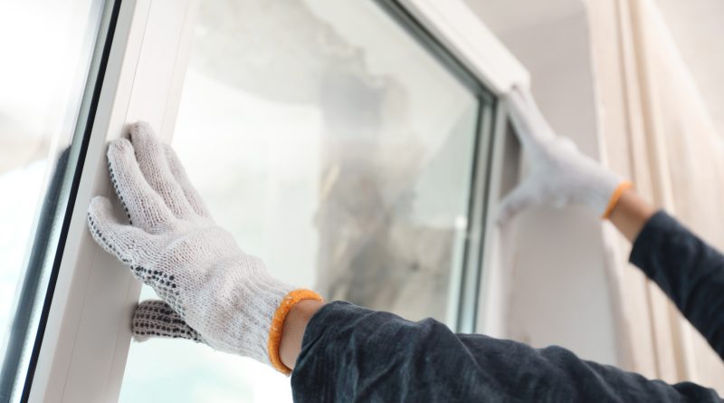 new construction windows being fit in building