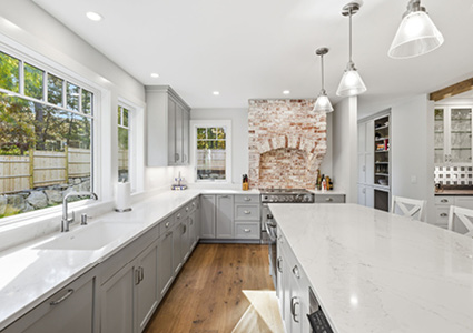 a bright, spacious, and modern kitchen with a classic farmhouse touch