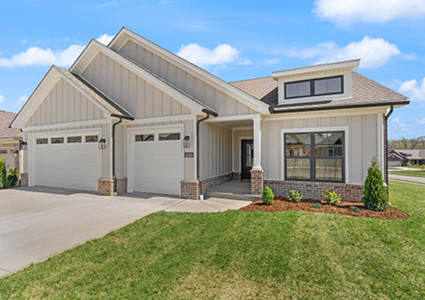 shows the front exterior of a modern, single-family residential home
