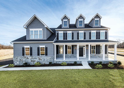 a large, modern two-story single-family home