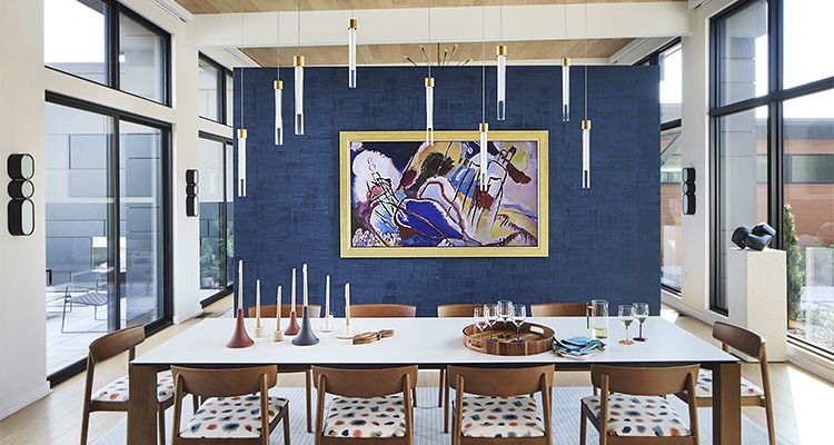 a modern, bright, and stylish dining room featuring a mix of bold accents and natural wood textures