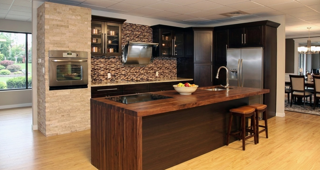 Butcher block countertops are constructed from strips of hardwood glued together to form a solid surface. PKB Cabinetry offers butcher block in three finishes: Natural, Espresso, and Whitewash, available in various lengths (26", 36", 48") and widths (98", 122") with a standard 2" thickness.