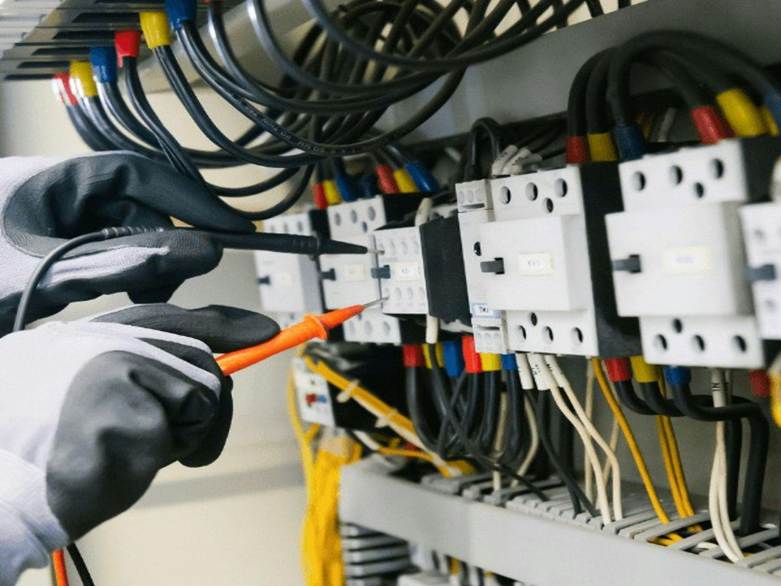 electrician working on plug sockets
