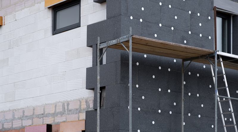 modern thermal insulation materials. building New House in process insulation of the wall of the house