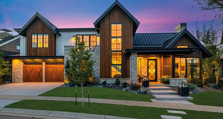 From secret speakeasies to five-star craftsmanship, Aliversa blends reputation with variety to deliver luxury in Colorado a modern rustic home with a mix of wood siding, stone veneer, and a metal roof