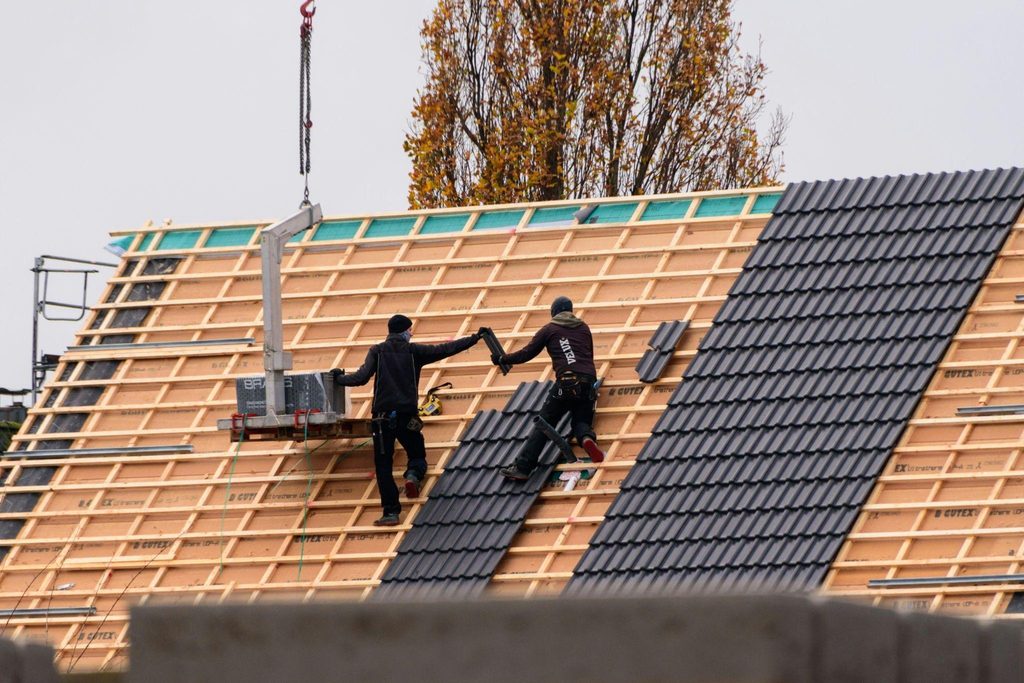 Construction workers on roof