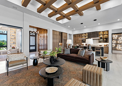 a luxurious, open-concept living space that seamlessly integrates a modern living room and kitchen